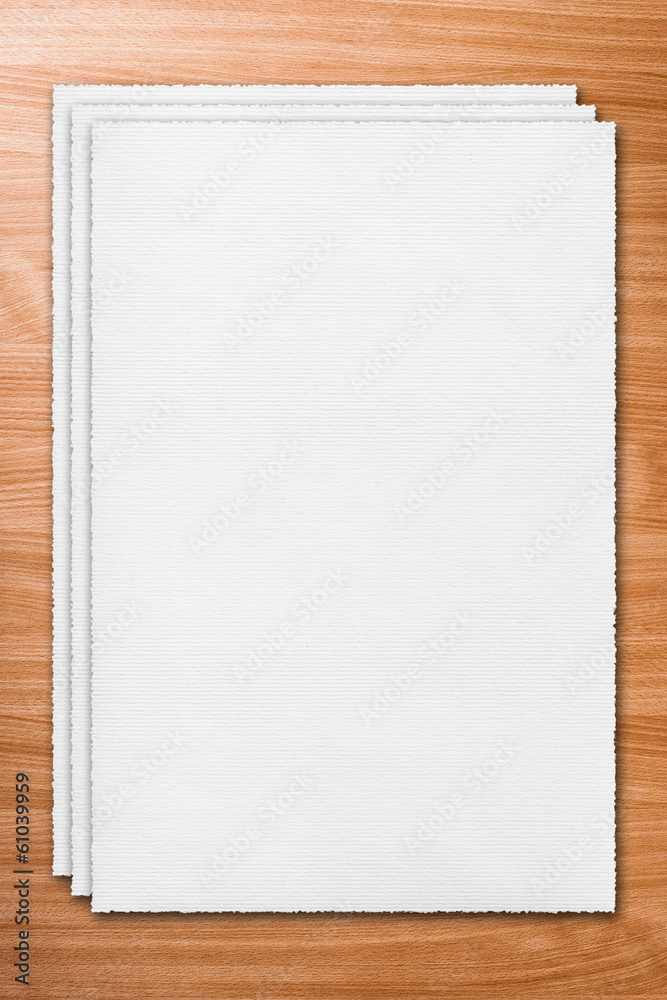 White pages of paper on the wood White pages of paper on the wood
