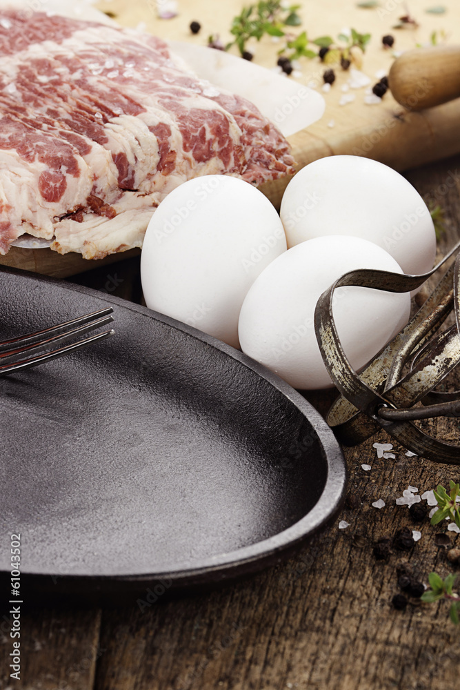 Pan with Fresh Eggs and Bacon Pan with Fresh Eggs and Bacon