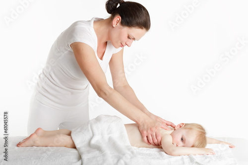 Massage therapist with her little patient.