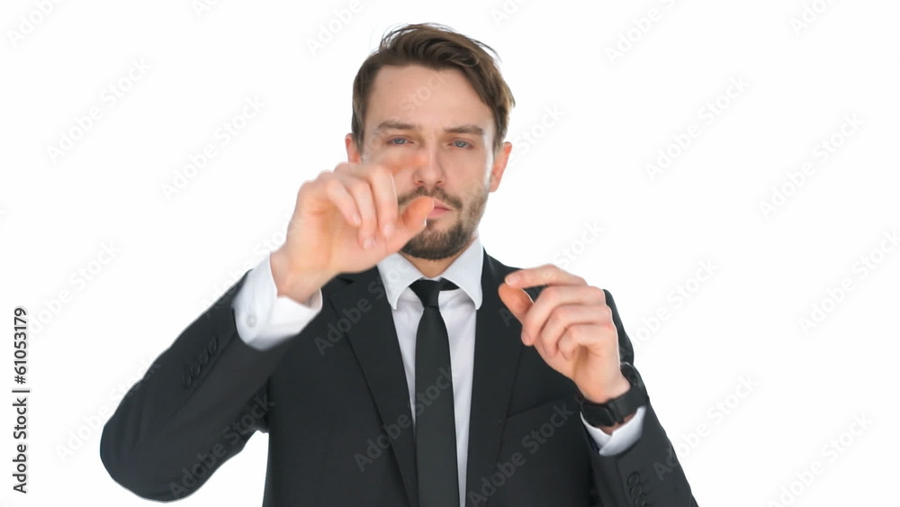 Businessman navigating on a virtual touchscreen Businessman navigating on a virtual touchscreen