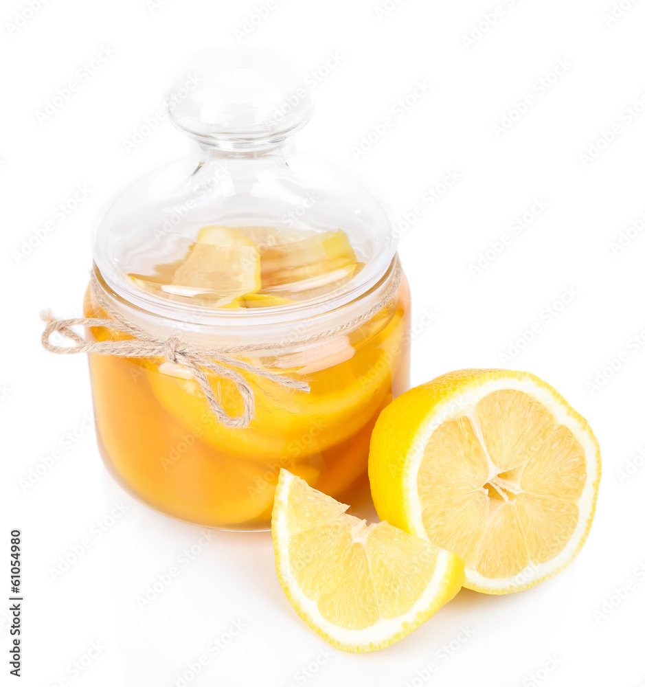 Tasty lemon jam isolated on white