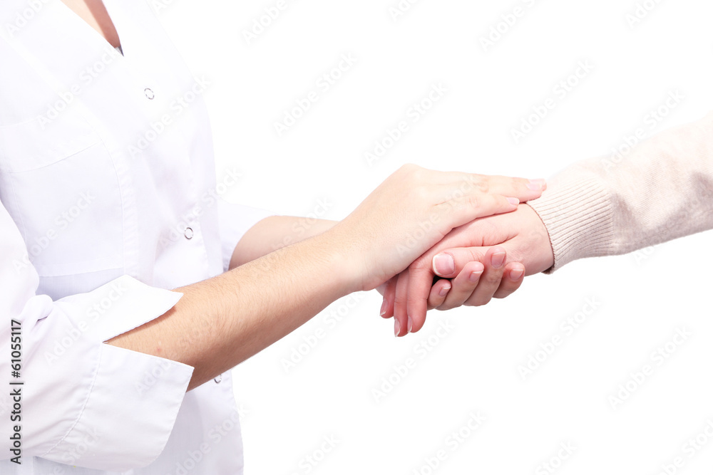 Medical doctor holding hand of patient, isolated on white Medical doctor holding hand of patient, isolated on white