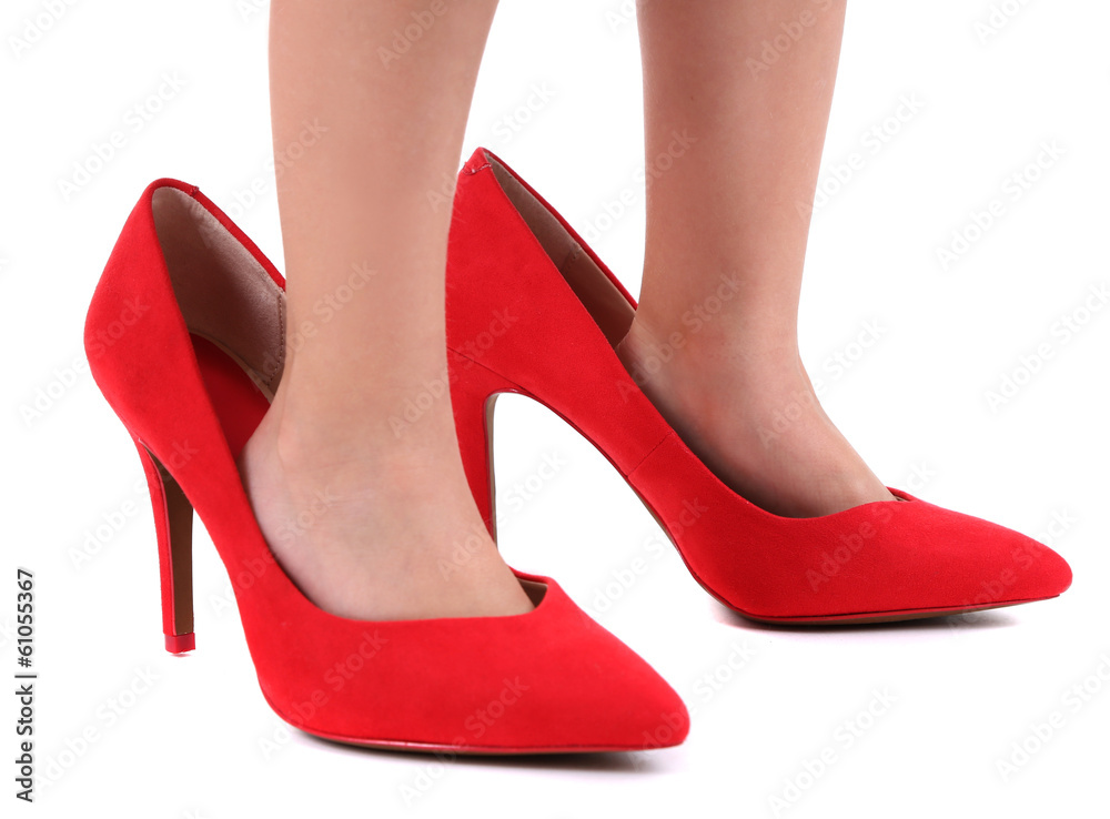 Little girl in red shoes isolated on white Little girl in red shoes isolated on white