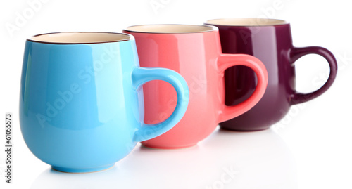 Colorful cups isolated on white