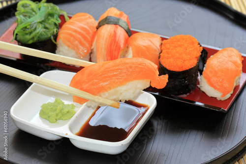 salmon,shrimp,seaweed sushi in the tray