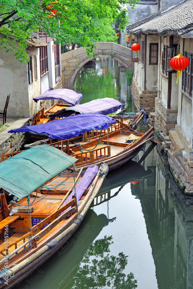 Fototapeta premium Zhouzhuang, Tourist boat in a village canal.