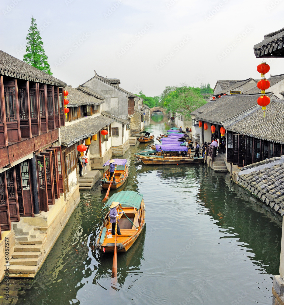 Fototapeta premium Zhouzhuang, Tourist boat in a village canal.