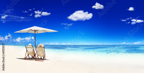 Couple Relaxing on The Beach