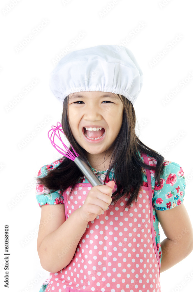 Little asian girl with kitchen ware concept Little asian girl with kitchen ware concept