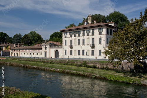 Palace on the riverbank in Cassinetta di Lugagnano