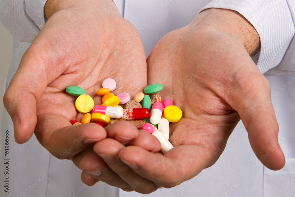 pill in a hand pill in a hand