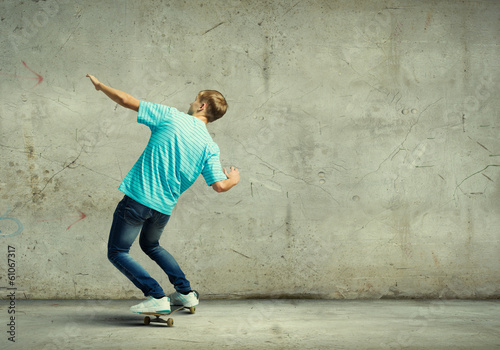 Fototapeta Naklejka Na Ścianę i Meble -  Teenager on skateboard