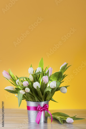 Bouquet of white tulips in lovely pot