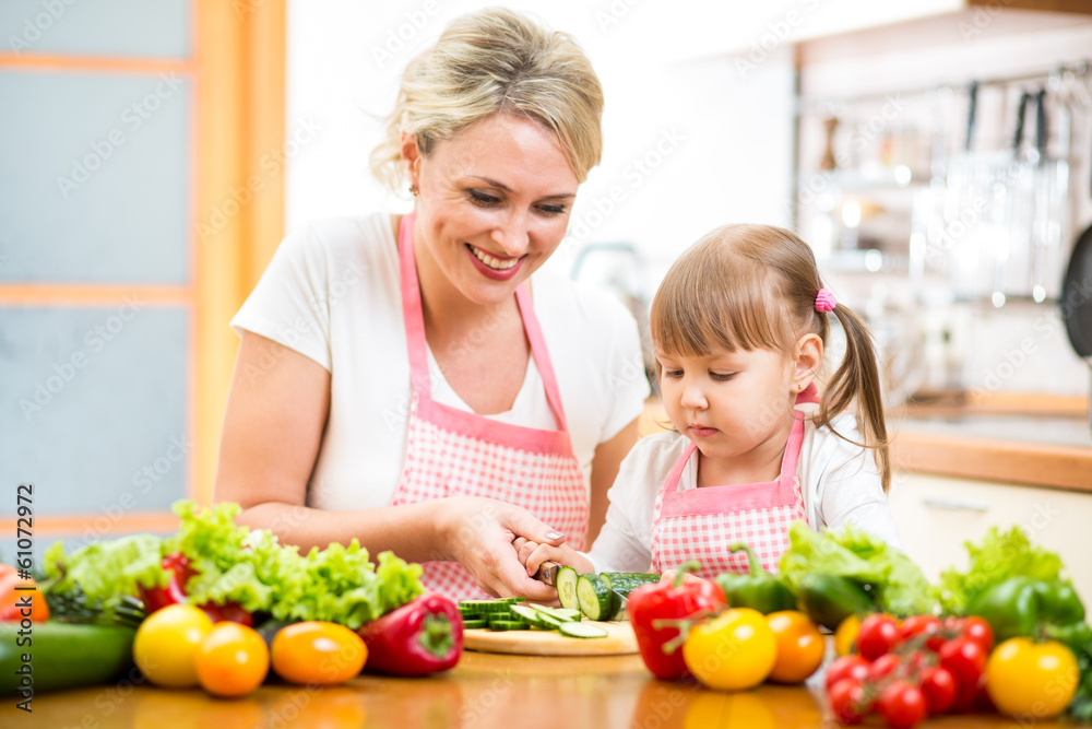mom and kid preparing healthy food