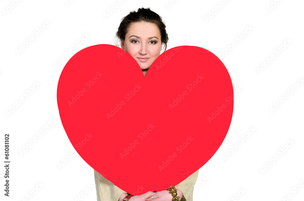 Woman with huge heart made of red paper Woman with huge heart made of red paper