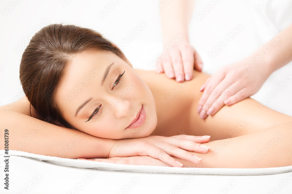 Fototapeta premium Massage. Close-up of a Beautiful Woman Getting Spa Treatment