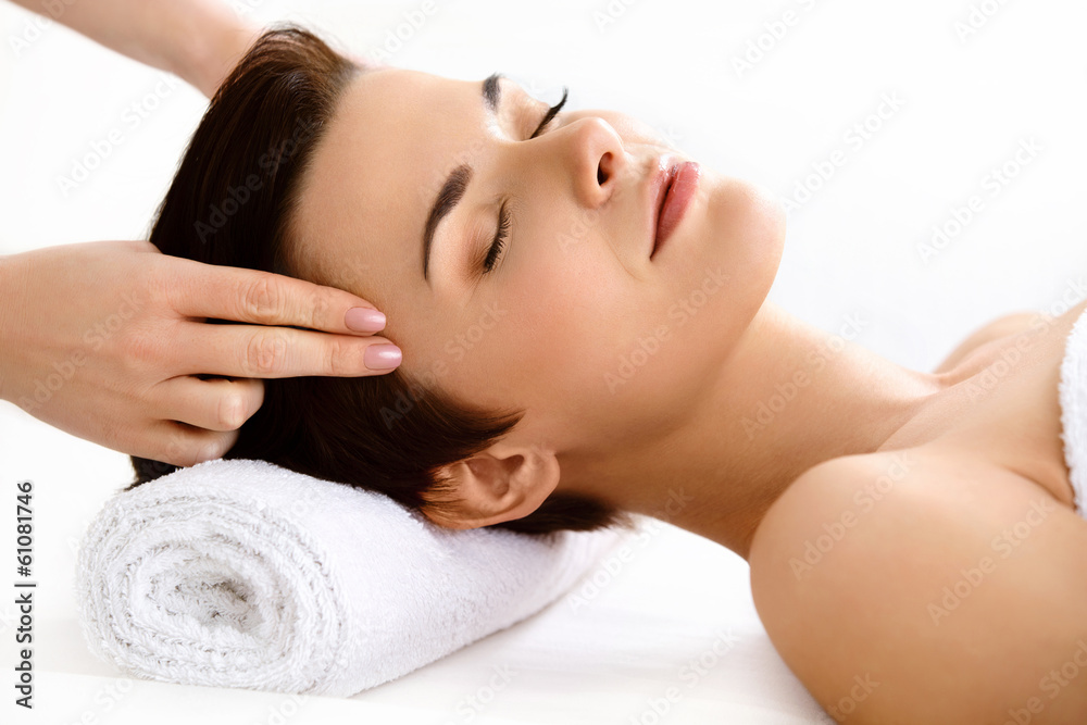 Face Massage. Beautiful Woman Getting Treatment in Spa Salon Face Massage. Beautiful Woman Getting Treatment in Spa Salon
