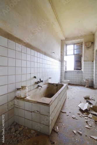 Old abandoned bath with window