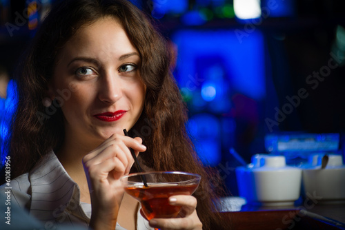 young woman in a bar