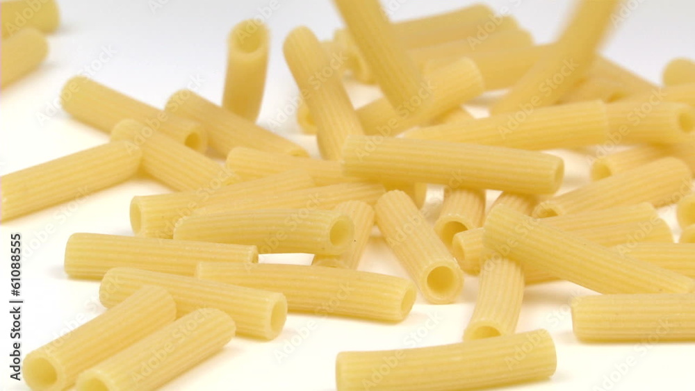 rigatoni pasta falling and filling the screen in slow motion rigatoni pasta falling and filling the screen in slow motion