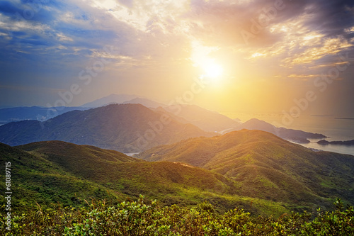 Beautiful summer landscape in the mountains with the sun at dawn