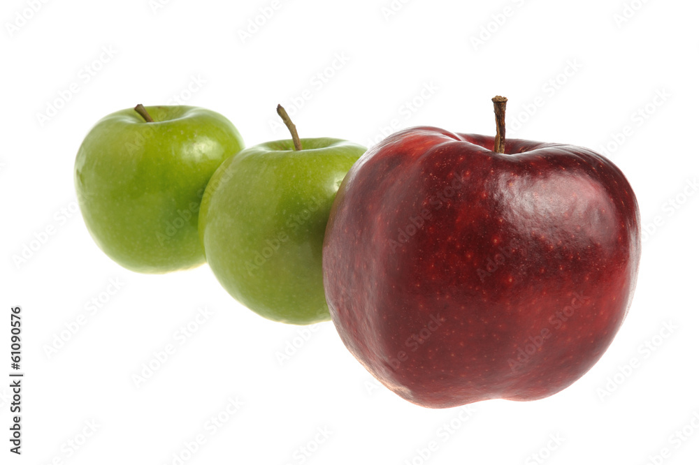 One red apple and two green apples isolated One red apple and two green apples isolated