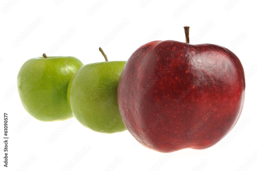 One red apple and two green apples isolated
