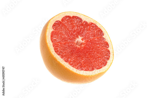 A half of grapefruit on the white isolated