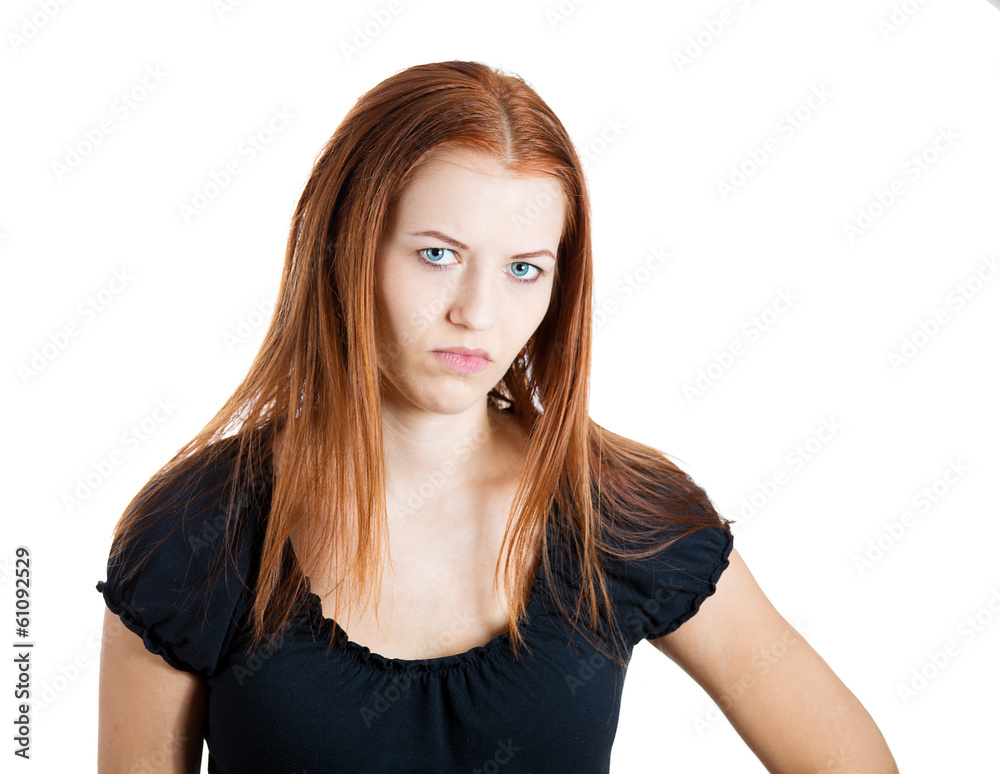 Grumpy woman with negative face expression on white background