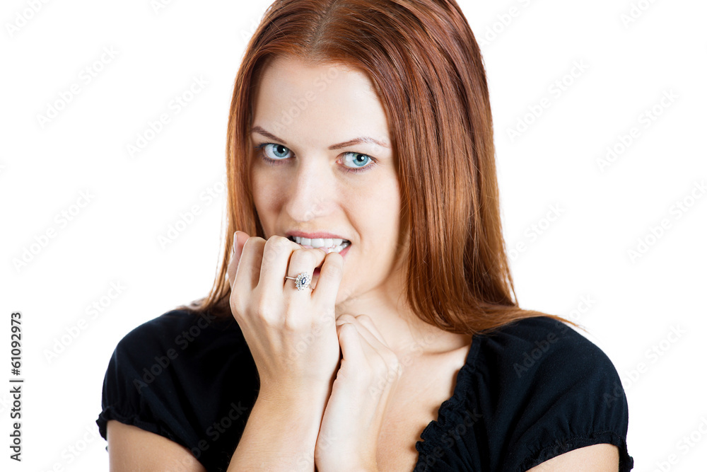 Nervous, anxious woman biting her fingernails Nervous, anxious woman biting her fingernails