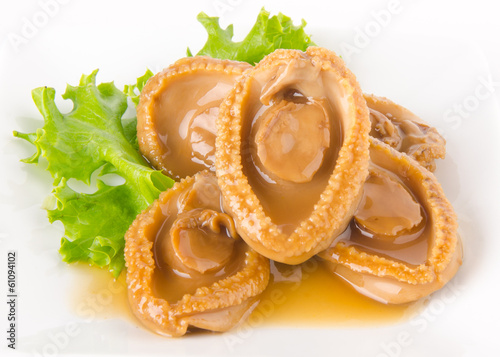 Abalones. Chinese cuisine abalone on background.