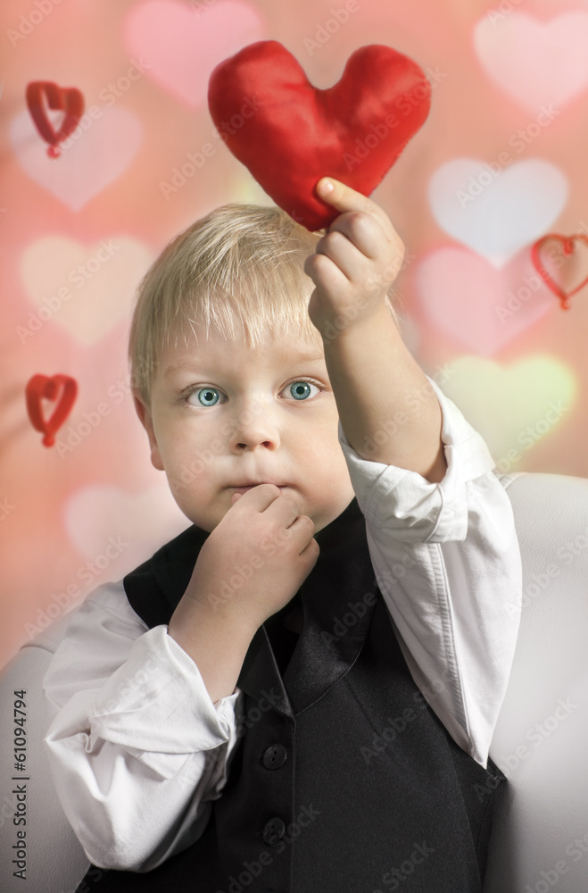 Little boy with red Heart in hands. Valentines Day concept Little boy with red Heart in hands. Valentines Day concept