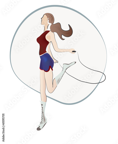 Woman with jumping rope in a fitness gym