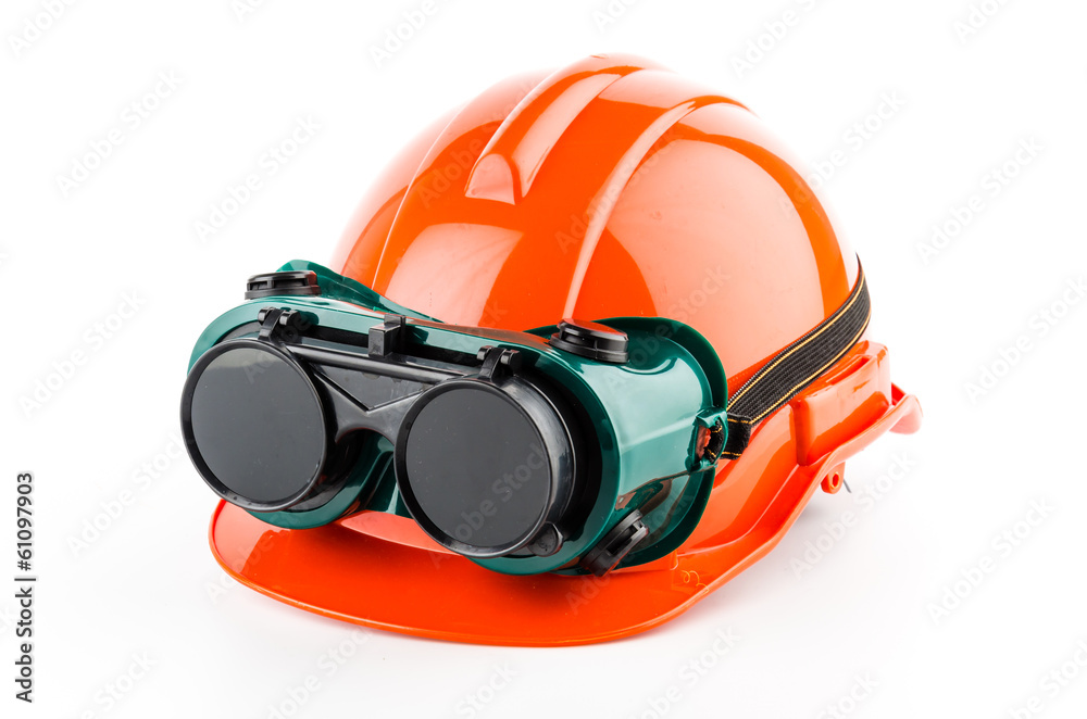 Safety helmet and goggles glasses isolated on white background Safety helmet and goggles glasses isolated on white background