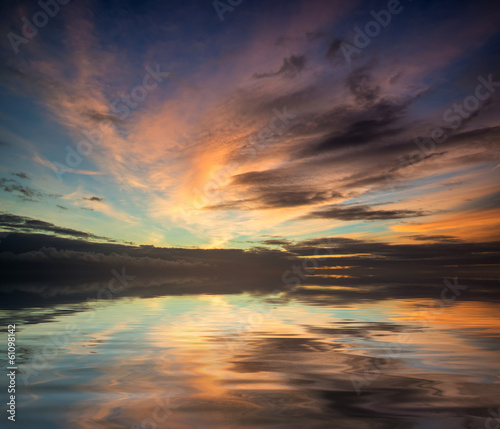 Vibrant beautiful pink and blue cloudy sky sunrise