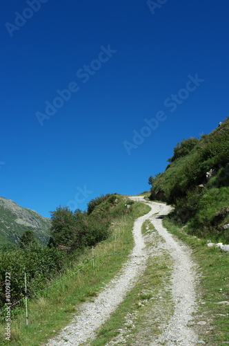 Uphill unsealed road in the mountains