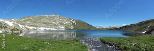 Beautiful panorama of the Retico Lake in the Swiss alps