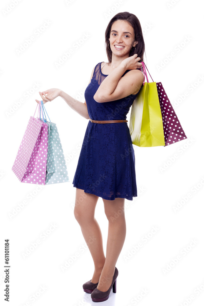 Lovely woman standing with shopping bags, isolated on white Lovely woman standing with shopping bags, isolated on white