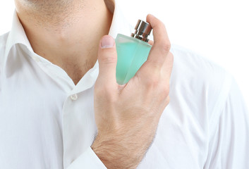 Fototapete Schönheitssalon Gepflegter Herr mit Eau de Parfum  © Africa Studio