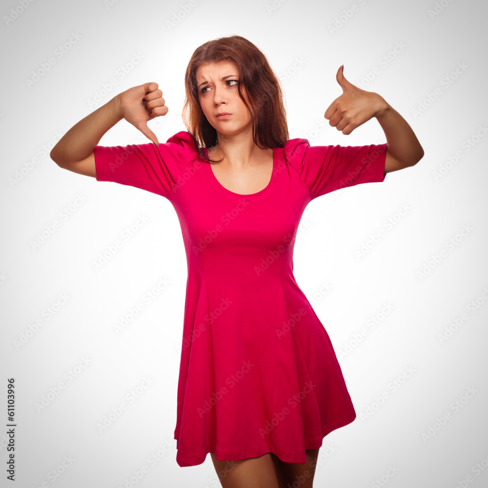 woman girl shows signs of yes and no, hand fingers isolated gray woman girl shows signs of yes and no, hand fingers isolated gray