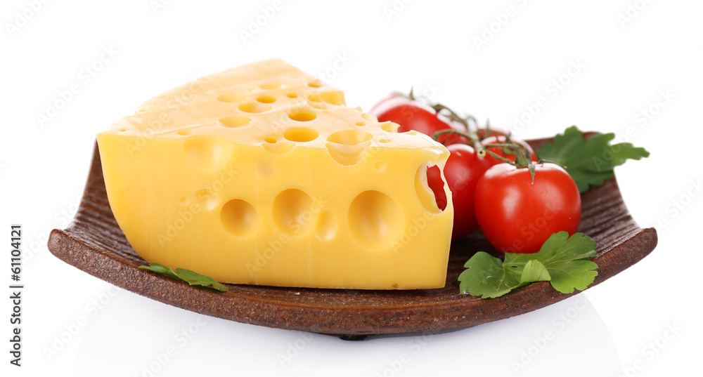 Piece of cheese on plate, isolated on white