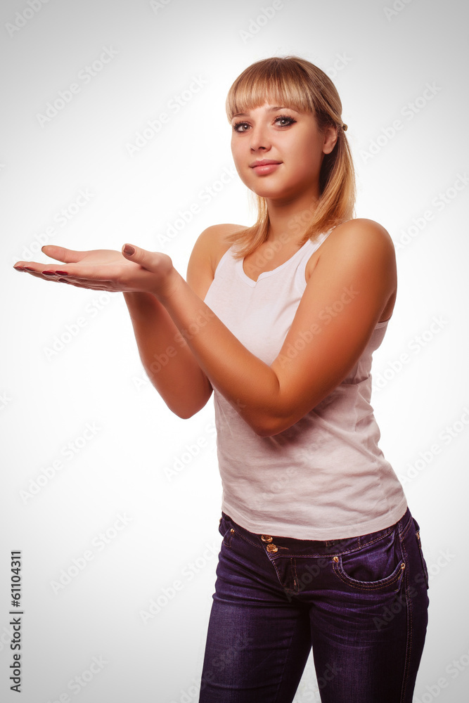 woman portrait happy young girl showing open hand holding isolat woman portrait happy young girl showing open hand holding isolat