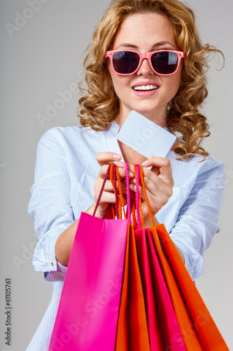 happy woman holding blank card