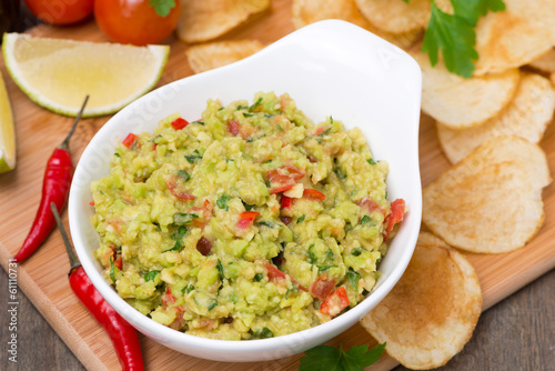 snack - Mexican sauce guacamole and chips, top view
