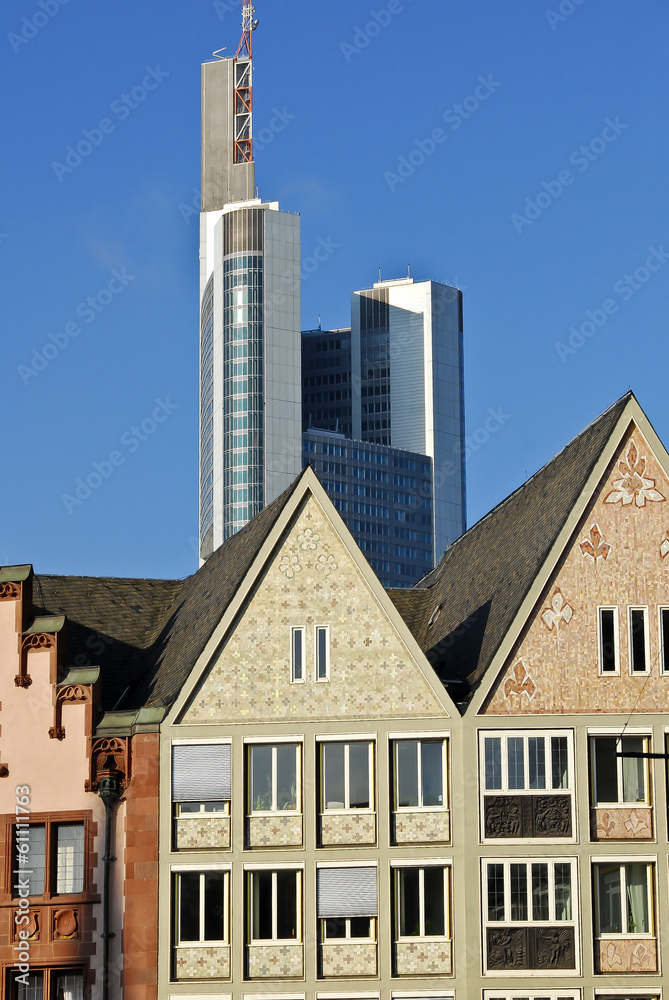 Frankfurt’s historic buildings contrasting with a skyscraper. Frankfurt’s historic buildings contrasting with a skyscraper.