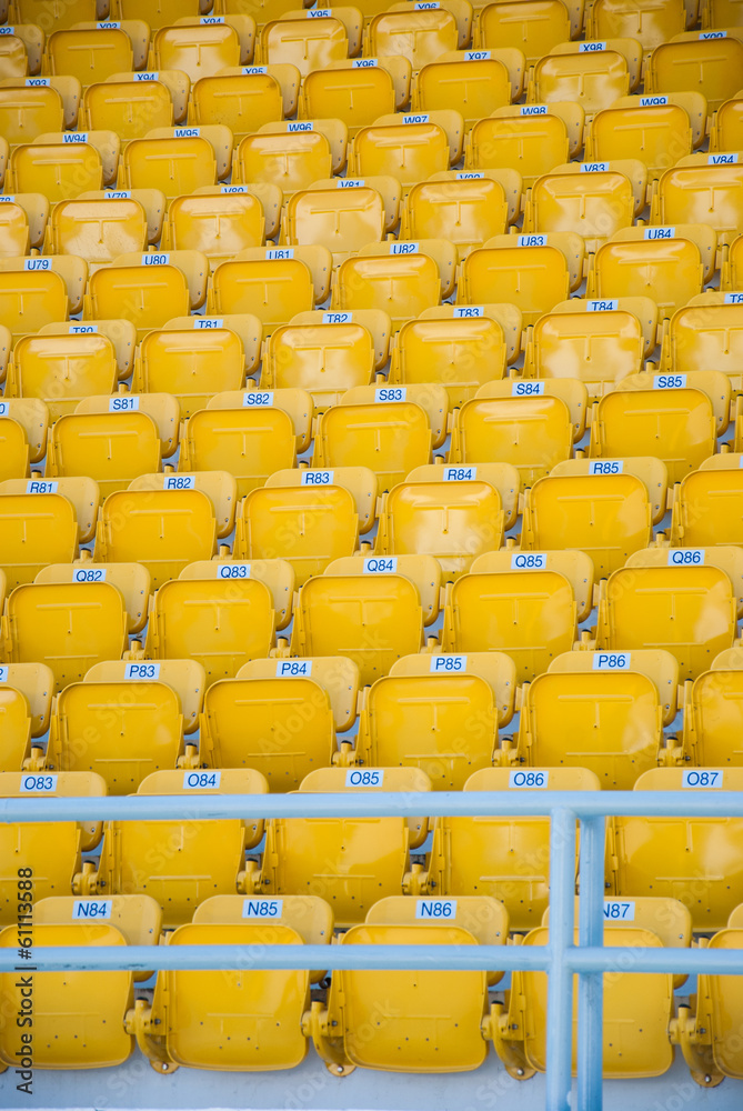 Fototapeta premium empty, yellow stadium seats