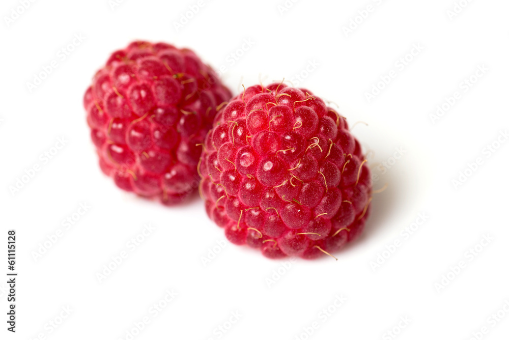 Ripe raspberry on the white background Ripe raspberry on the white background