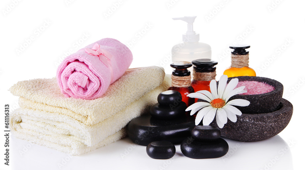 Beautiful spa setting with flower isolated on white Beautiful spa setting with flower isolated on white