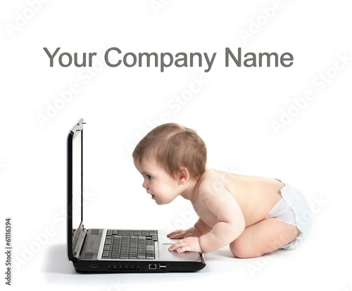 Cute baby girl and laptop i...