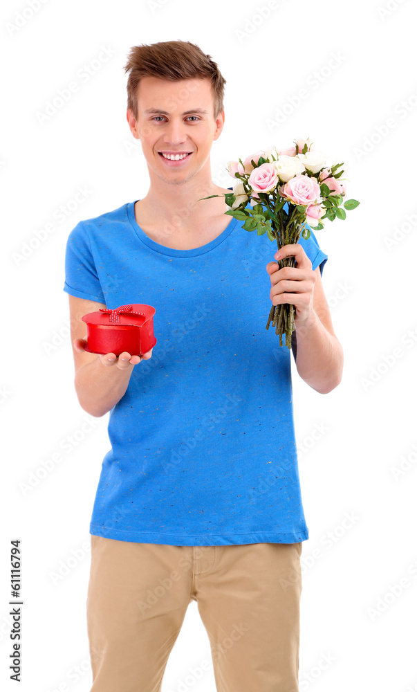 Portrait of handsome young man with flowers and gift, isolated Portrait of handsome young man with flowers and gift, isolated